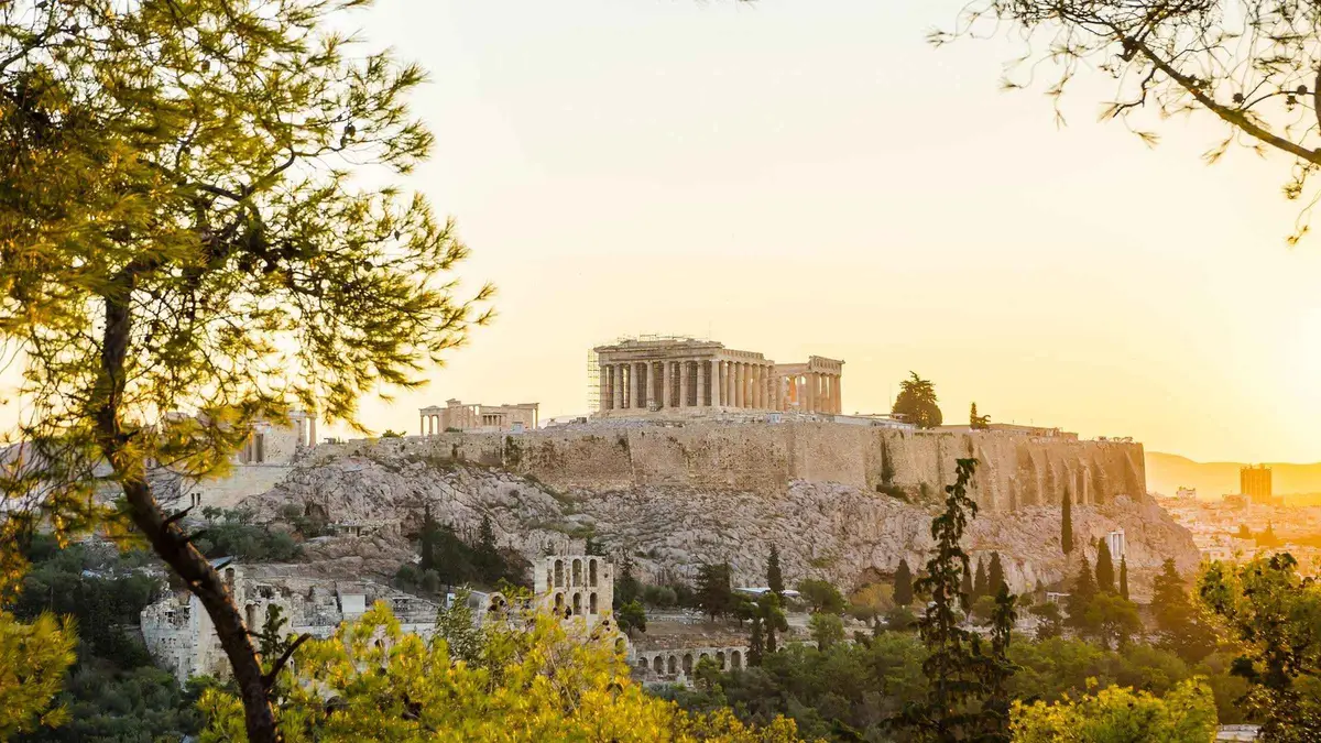 A walking group in the Ancient Agora where Athenian democracy met, in Athens, Greece