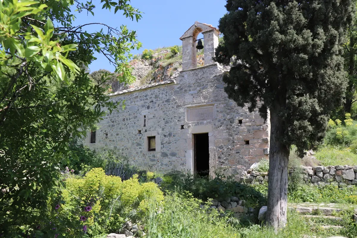 A surviving stone church among the ruins of Palaiochora, the abandoned medieval town on Aegina near Athens, Greece