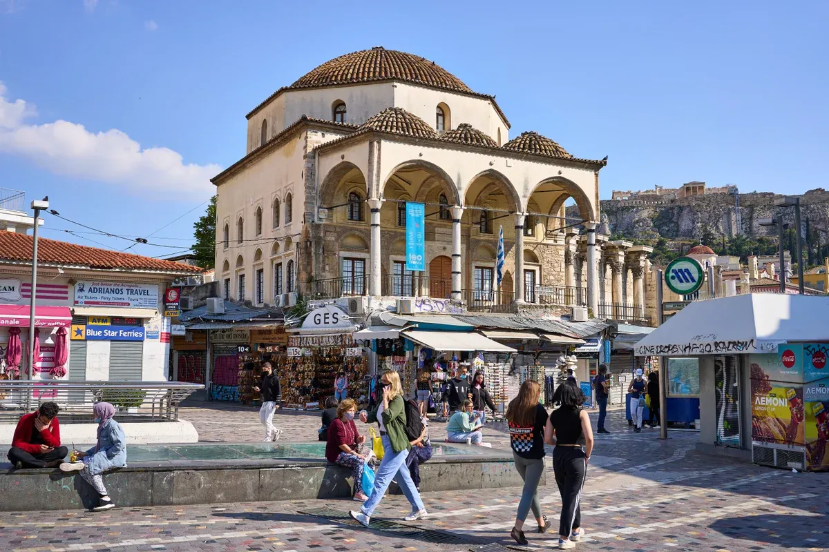 The Tzistarakis mosque of 1759 on Monastiraki square with the Acropolis behind, Athens, Greece
